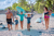 Little Hands Hawaii Founder, Rosalyn Ardoin and her family on the beach