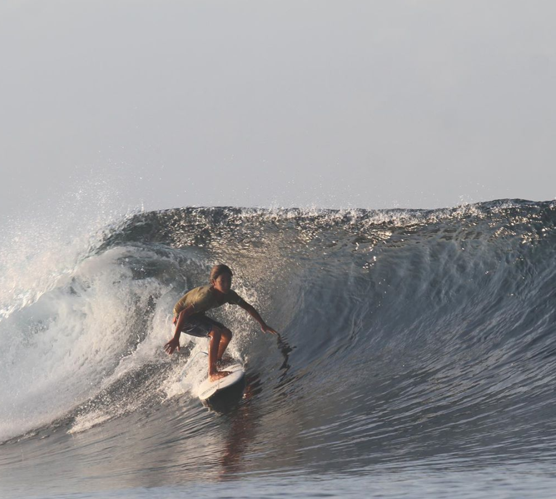 Kenny Milo Nishimoto surfing
